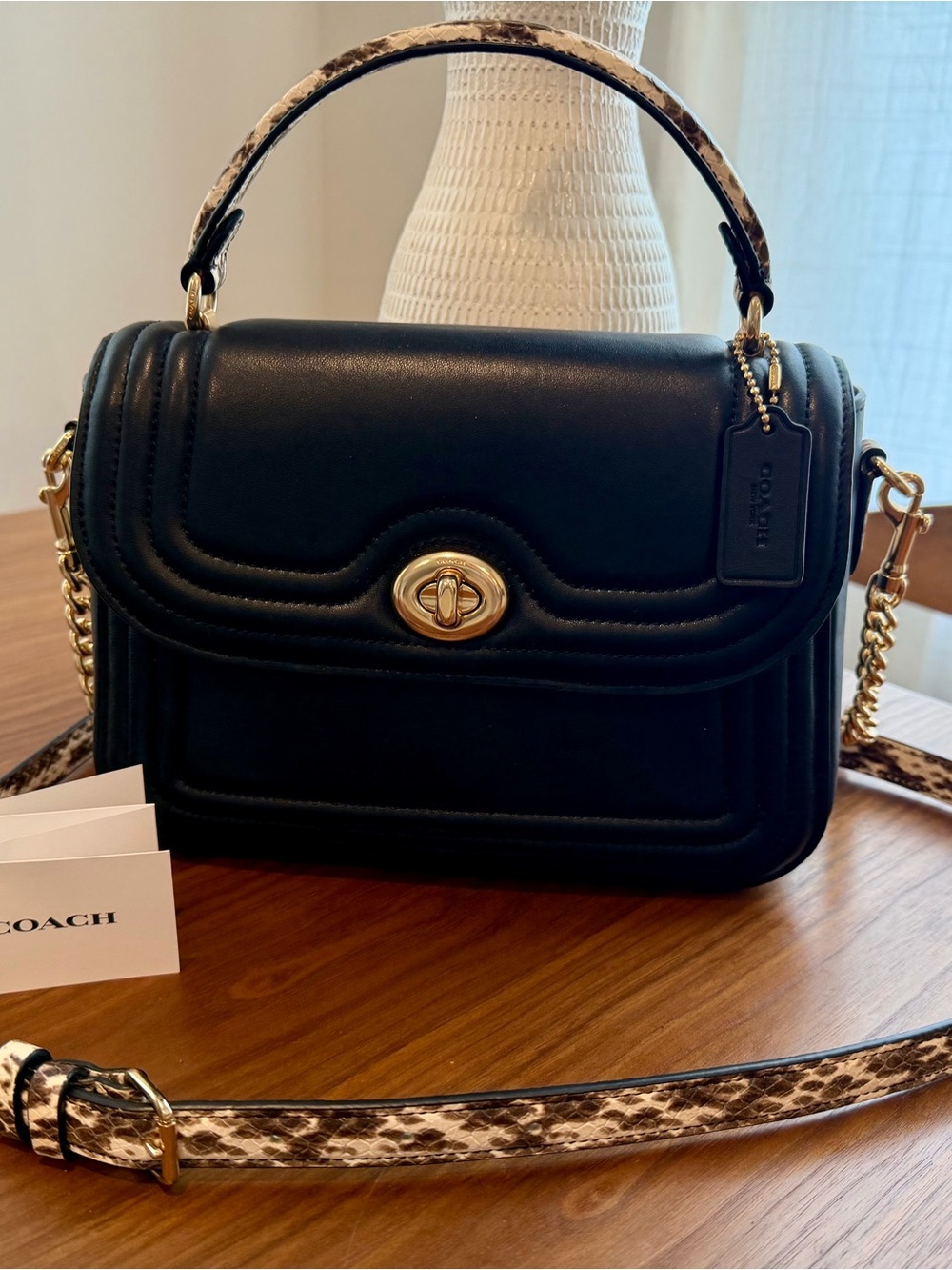 Coach Black Leather Shoulder Bag with Snakeskin-Print Strap